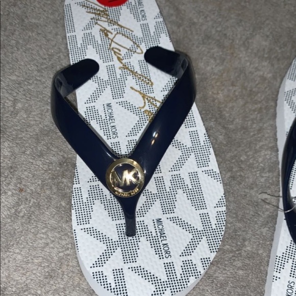 Michael Kors Shoes - NWT. Michael Kors flip flops